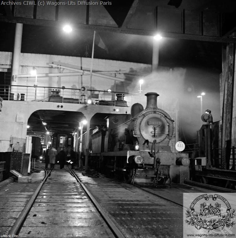 Wl the ferry boat from dover to dunkirk loaded with the night train carriages by a shunting locomotive 1952